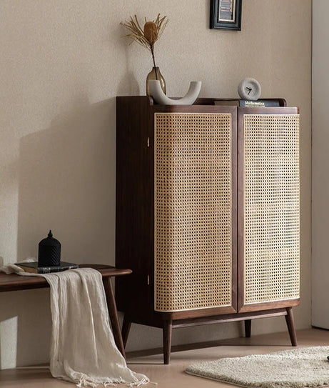 Wooden cabinet with wicker doors in a room setting